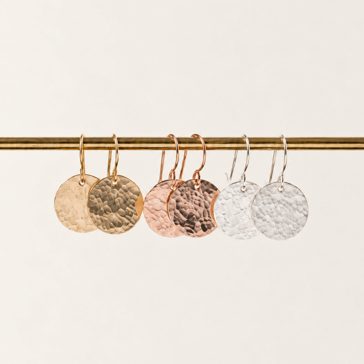 Hammered disc earrings in sterling silver, gold fill, and rose gold fill