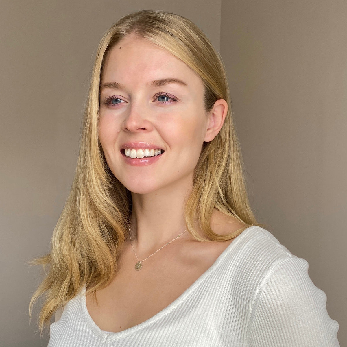 Model wearing a sterling silver initial necklace