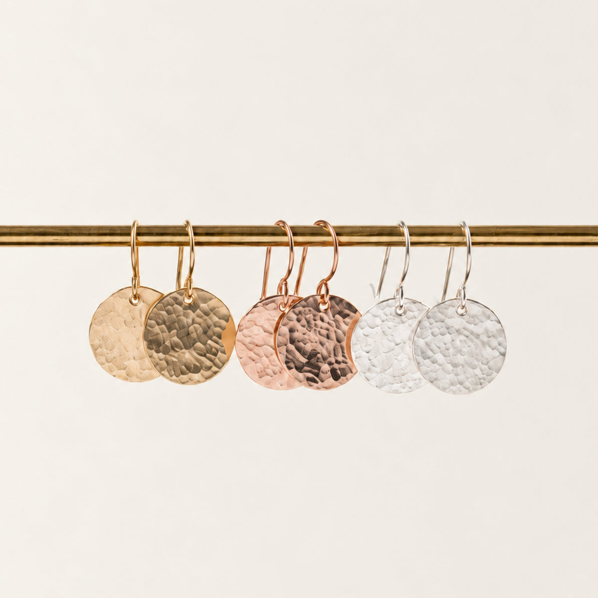 Hammered disc earrings in sterling silver, gold fill, and rose gold fill