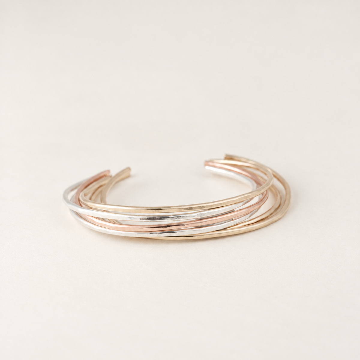 Hammered mixed metal cuff bracelets in sterling silver and gold fill